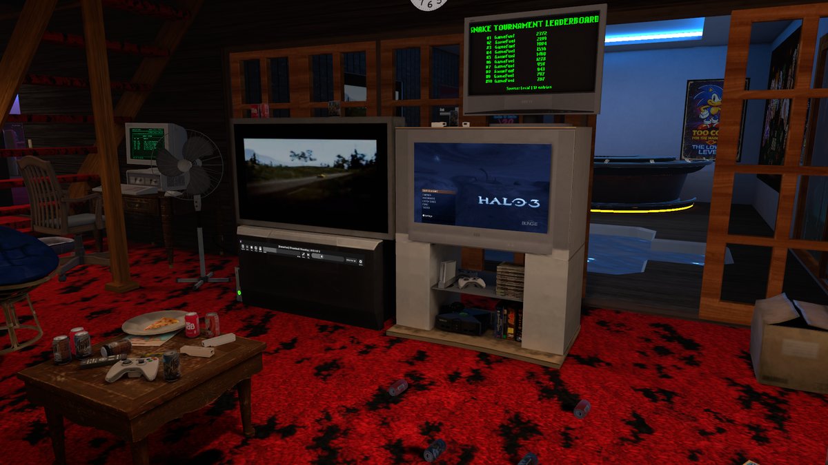 Lower Level VR: Inside the world: two old TVs, the snake leaderboard and the red carpet.
