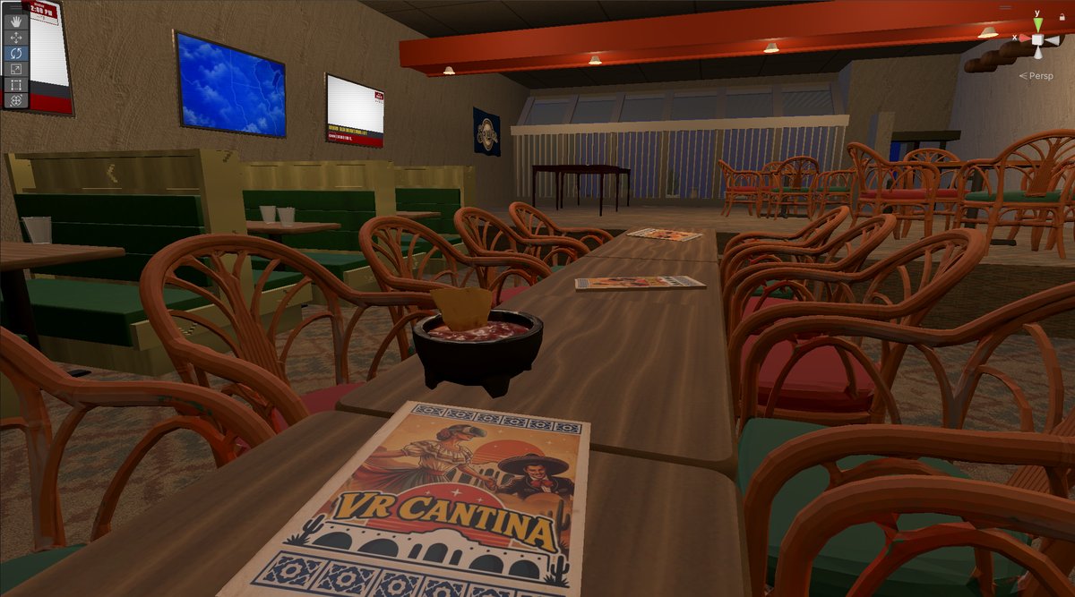 VR Cantina: The dining room inside Unity: booths, wicker chairs and the TV wall.